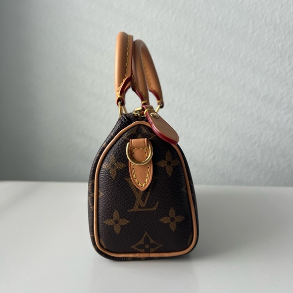 Louis Vuitton’s Nano Speedy/ Monogram canvas. - Picture 4 of 6